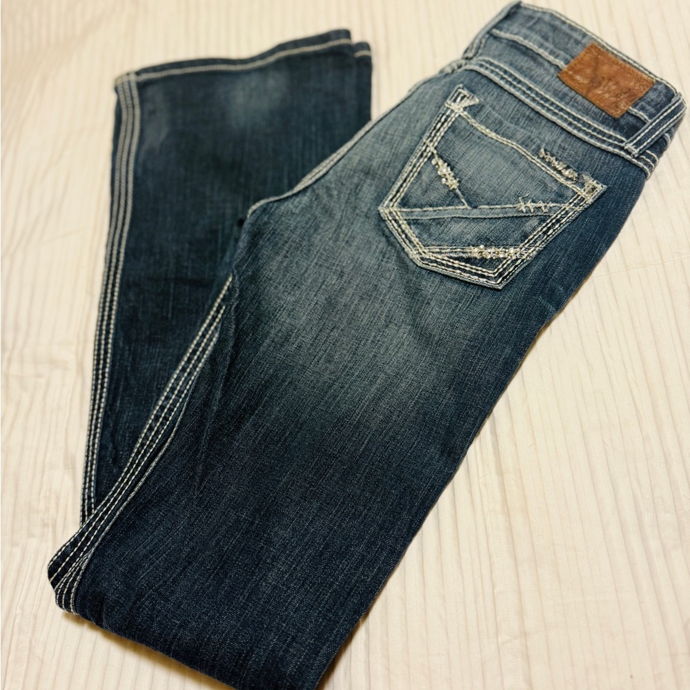 Women’s buckle statute flare jeans 27L
